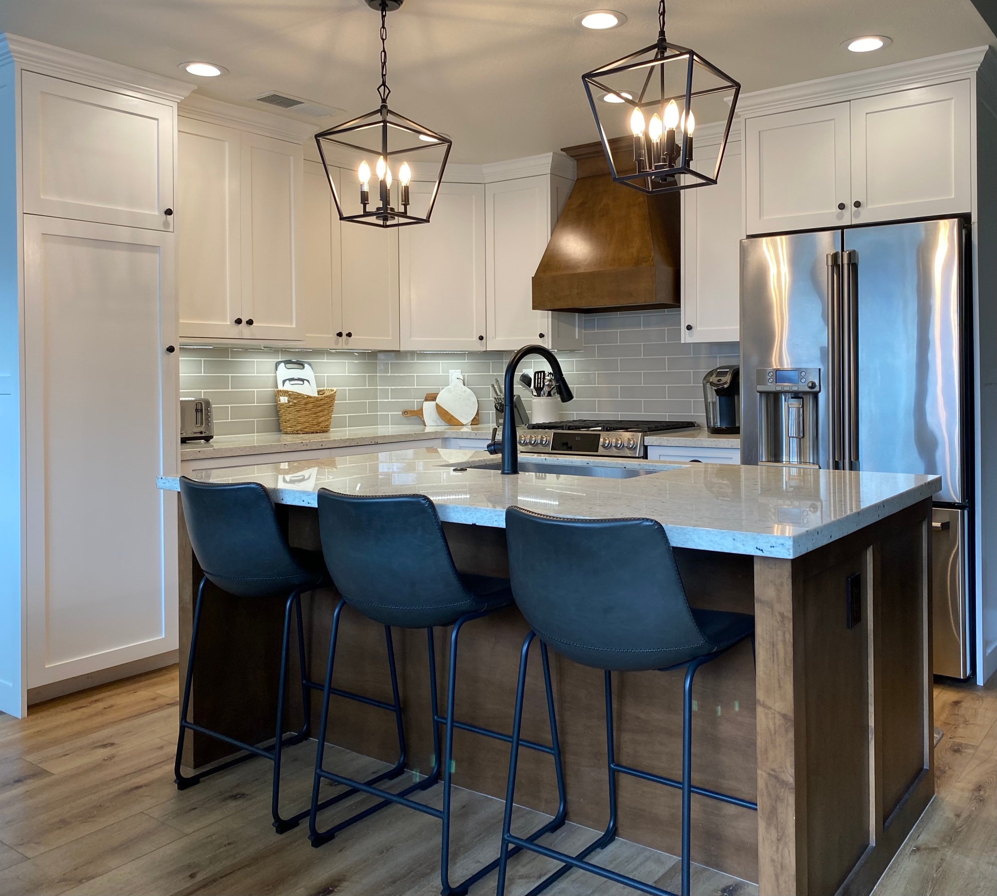 Small Farmhouse kitchen. Remodel Pendant lights white cabinets & granite countertops.